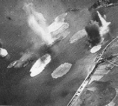 Heavy cruiser Tone under attack by Allied planes, Kure, 1945.