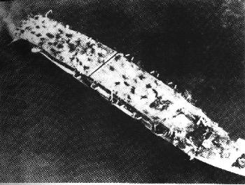 The devastated carrier Kaiyo after the British attack.